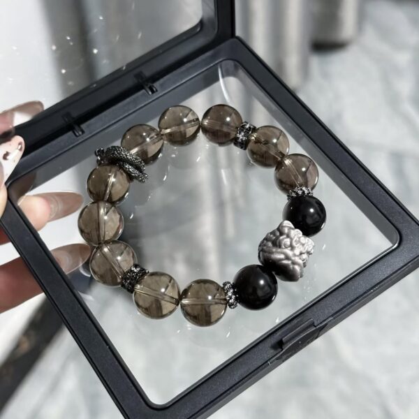 "León Protector" – Pulsera de Cuarzo Ahumado con Obsidiana Plateada y Dije de León